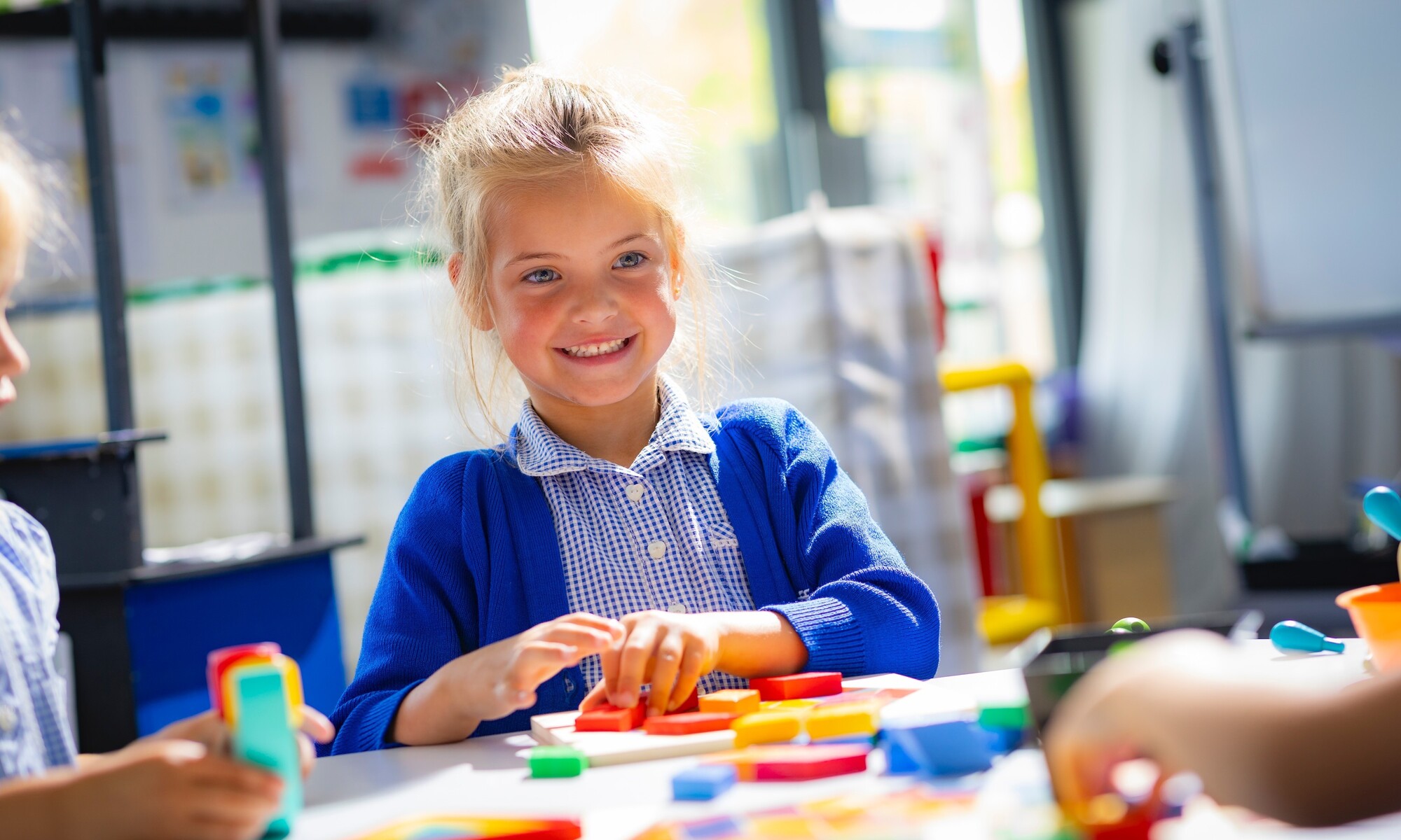 High Cliff Academy Pupil Smiling in the Classroom Image